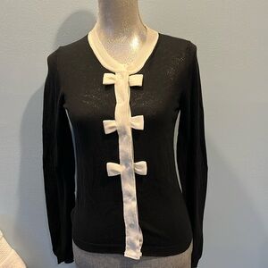 A very cute black light weight cardigan